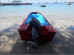 Standby boat with engine 30hp available during work at jetty